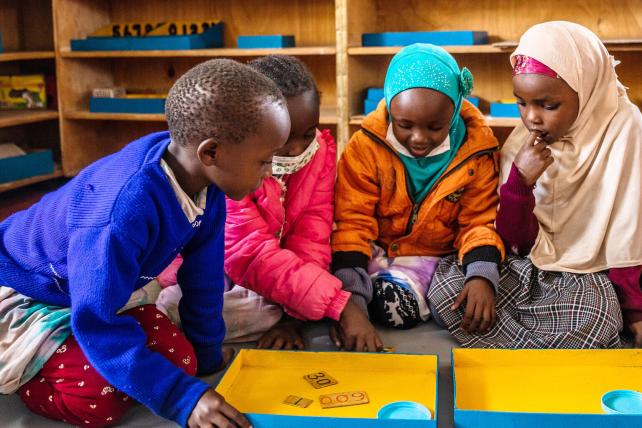 Children in a Corner of Hope Montessori classroom